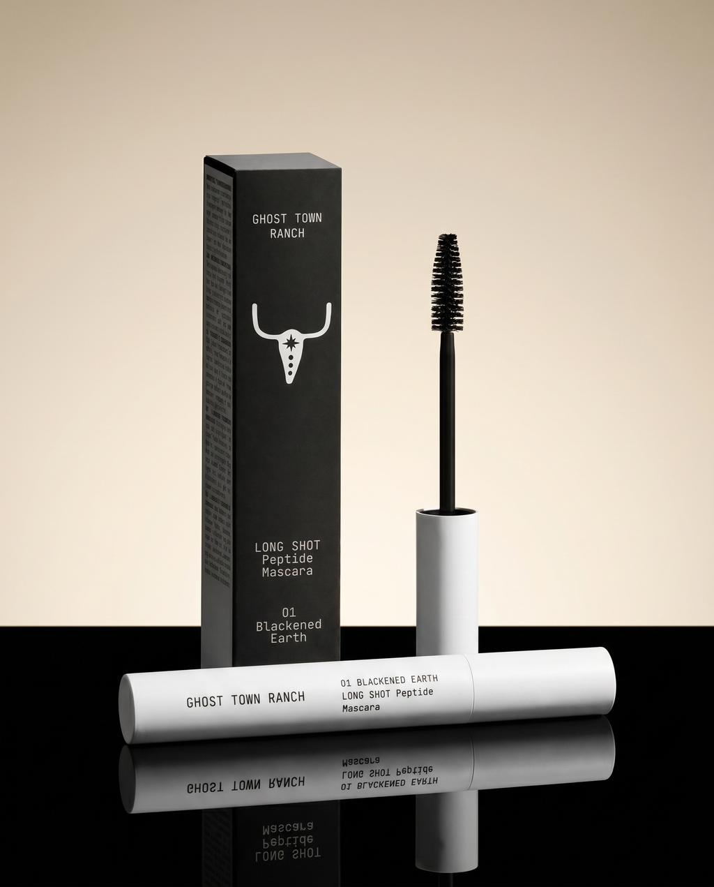 Ghost Town Ranch Long Shot Peptide Mascara in Blackened Earth, mimimal white tube and black brush.